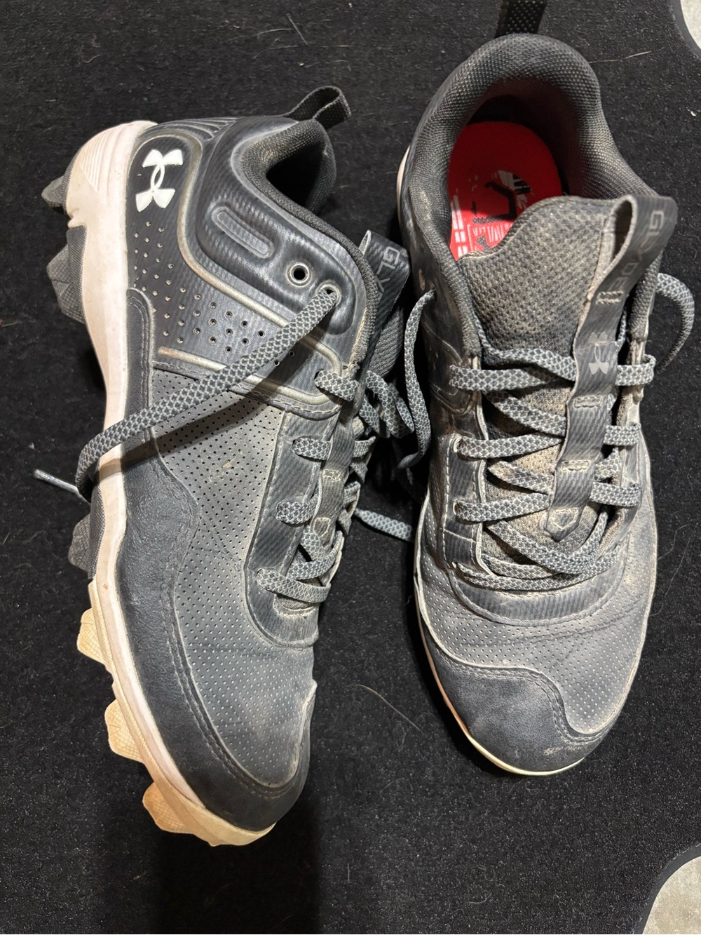 Under Armour Women’s Black and White Athletic Cleats